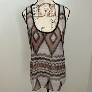 Large Dots top feature a tribal or southwestern-inspired geometric pattern.